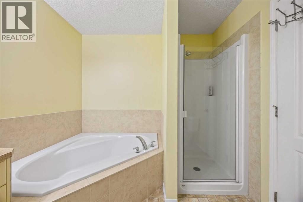 303 Westmount Court, Okotoks, Alberta  T1S 0B6 - Photo 30 - A2264302