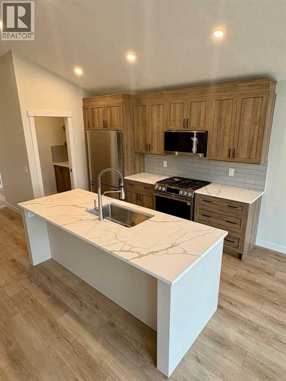 679 Anderson Close Nw, Diamond Valley, Alberta  T0L 2A0 - Photo 3 - A2262368