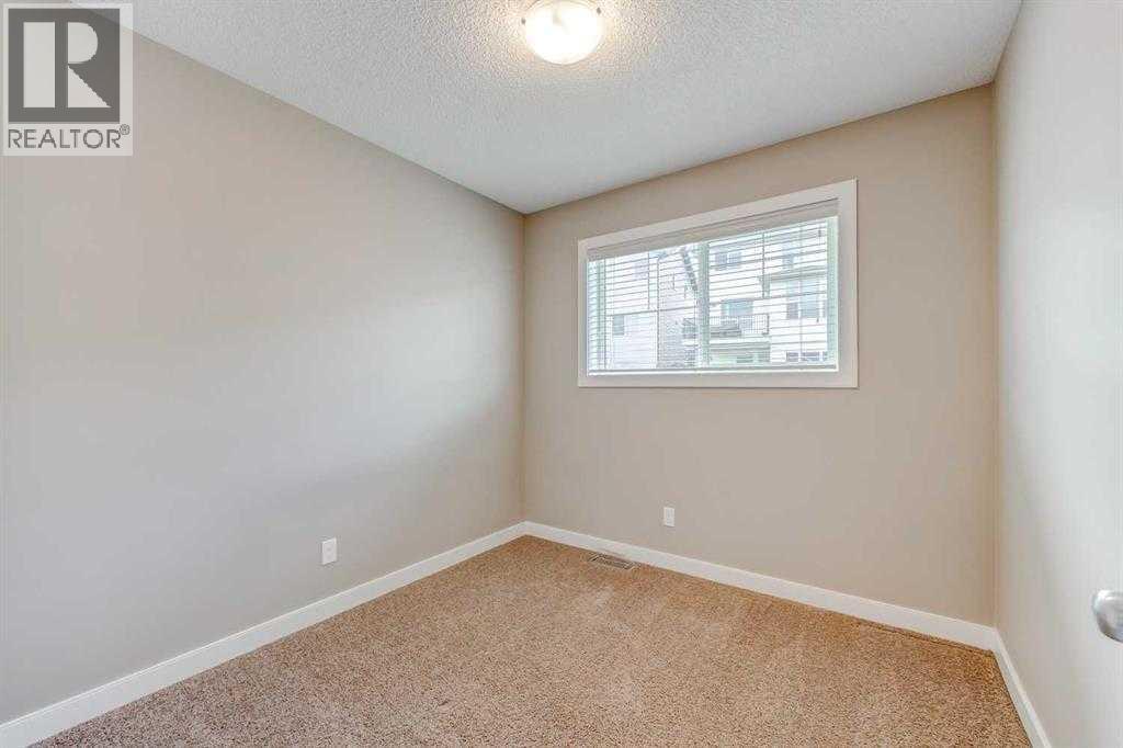 136 Pantego Lane Nw, Calgary, Alberta  T3K 0T1 - Photo 11 - A2266901