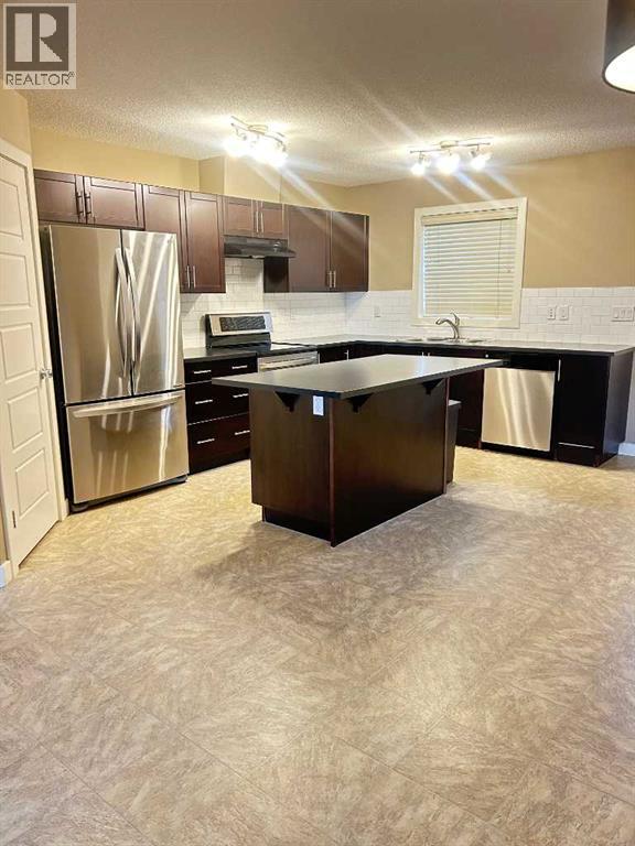 136 Pantego Lane Nw, Calgary, Alberta  T3K 0T1 - Photo 6 - A2266901