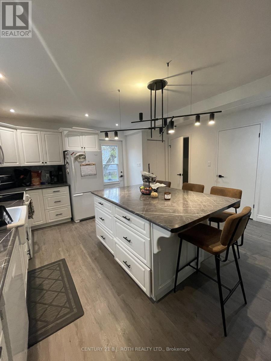 6 Stone Street, Springwater, Ontario  L0L 1P0 - Photo 4 - S12453098