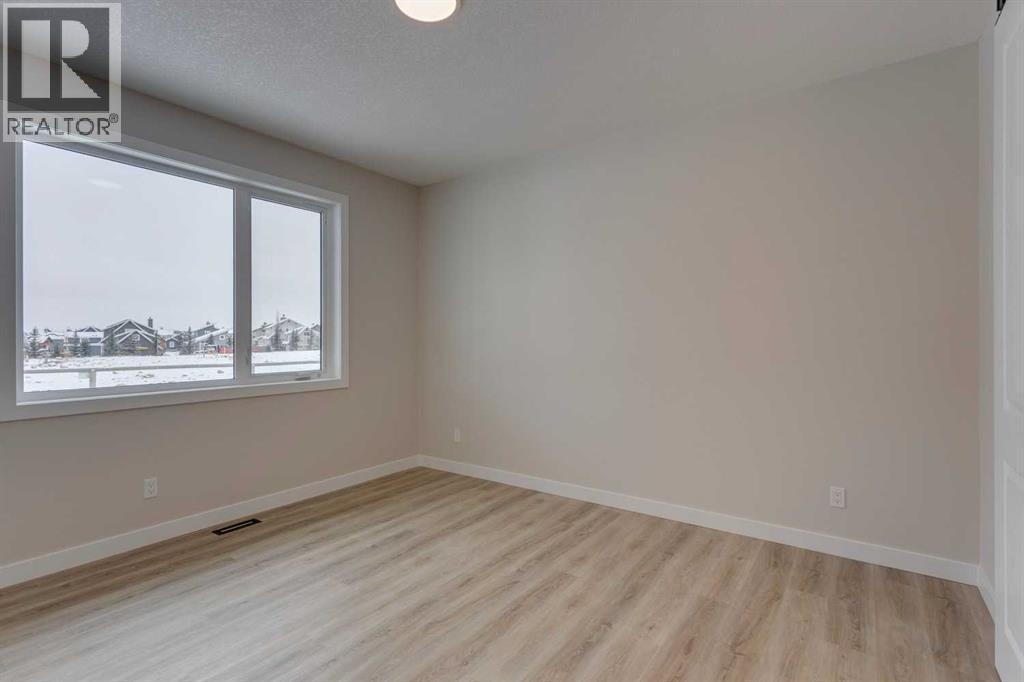 105 Cottageclub Drive, Rural Rocky View County, Alberta  T4C 1B1 - Photo 17 - A2266824
