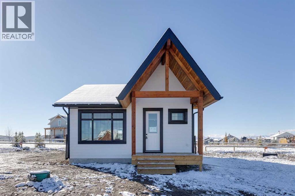 105 Cottageclub Drive, Rural Rocky View County, Alberta  T4C 1B1 - Photo 23 - A2266824