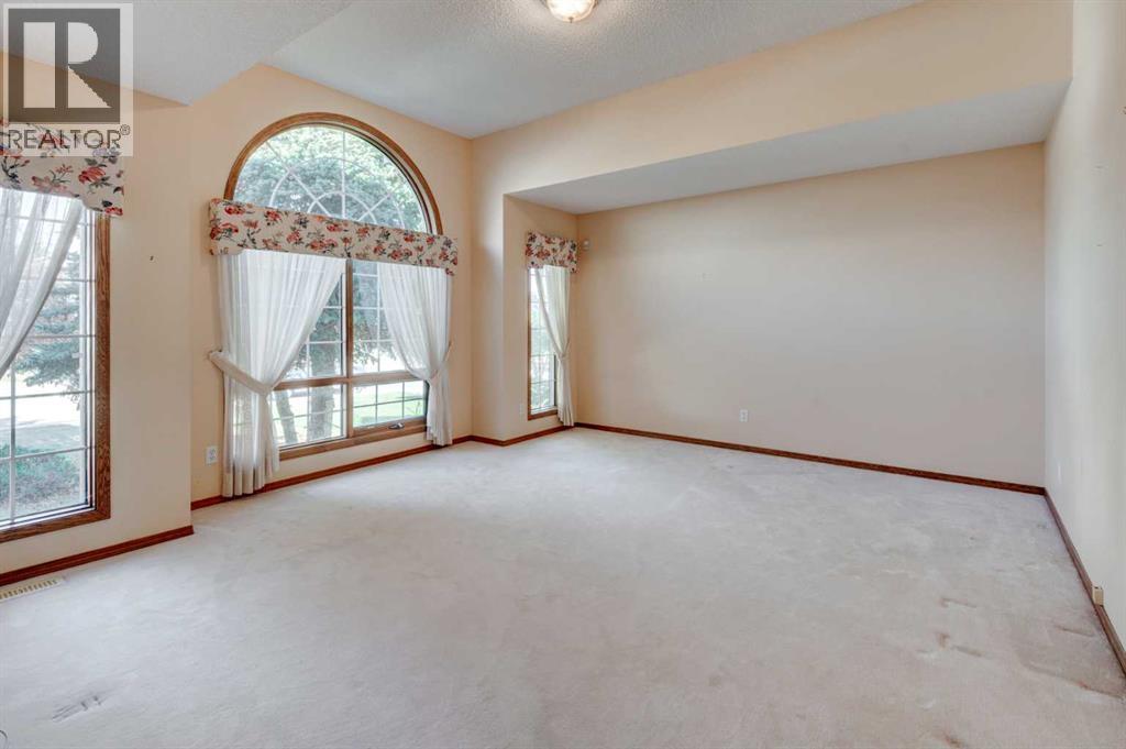 1567 Evergreen Drive Sw, Calgary, Alberta  T2Y 3B7 - Photo 4 - A2266781