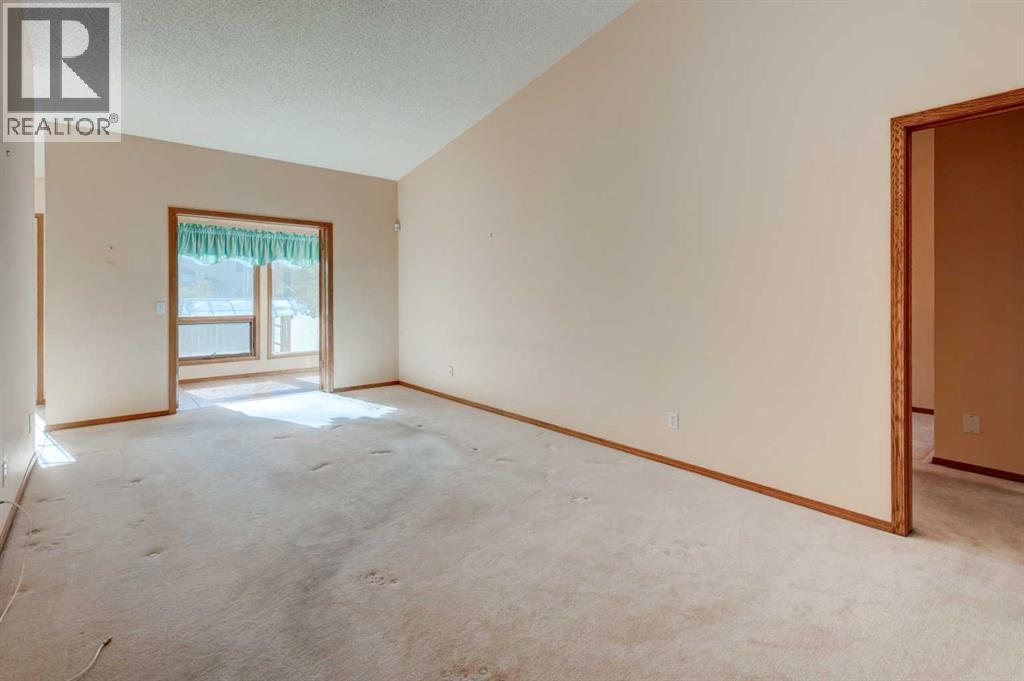 1567 Evergreen Drive Sw, Calgary, Alberta  T2Y 3B7 - Photo 9 - A2266781