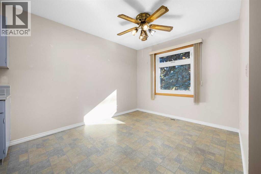 7031 Hunterbow Crescent Nw, Calgary, Alberta  T2K 4R4 - Photo 8 - A2265233