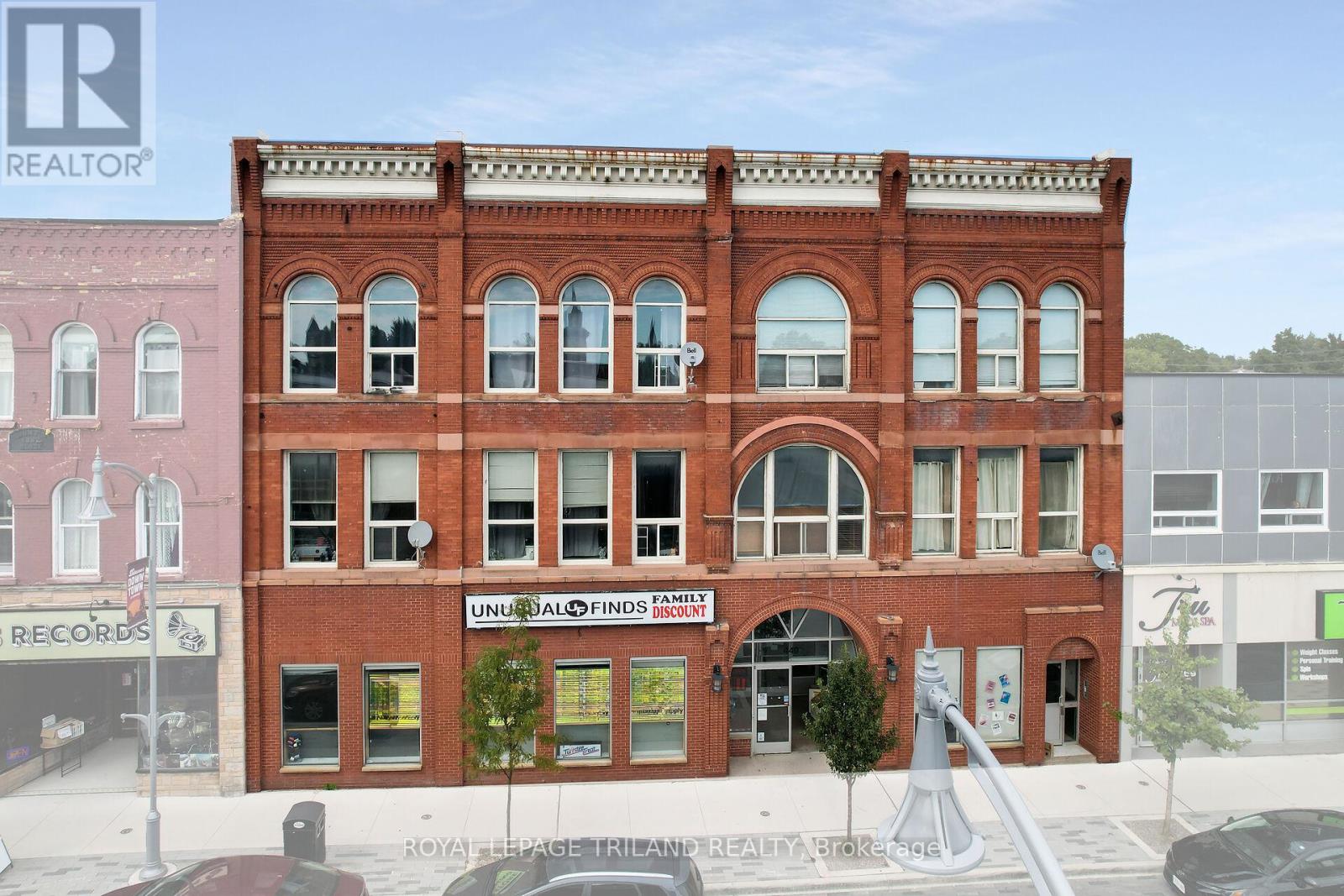 This mixed-use commercial property at 449-453 Talbot Street in the heart of Downtown St. Thomas presents a prime investment opportunity, offering the option of commercial space with vacant possession on closing or a fully tenanted building. Zoned C2, the property features an 8000 sq. ft. ground-floor commercial unit at 449 Talbot Street along with seven spacious loft-style residential units at 453 Talbot Street, each with separate hydro meters, hot water tanks, furnaces, and central air. With a gross annual rental income of $184,530, strong visibility, and excellent accessibility in a rapidly growing community, this property delivers solid returns and future growth potential. Extras: possibility of retail business for sale. (id:48254)