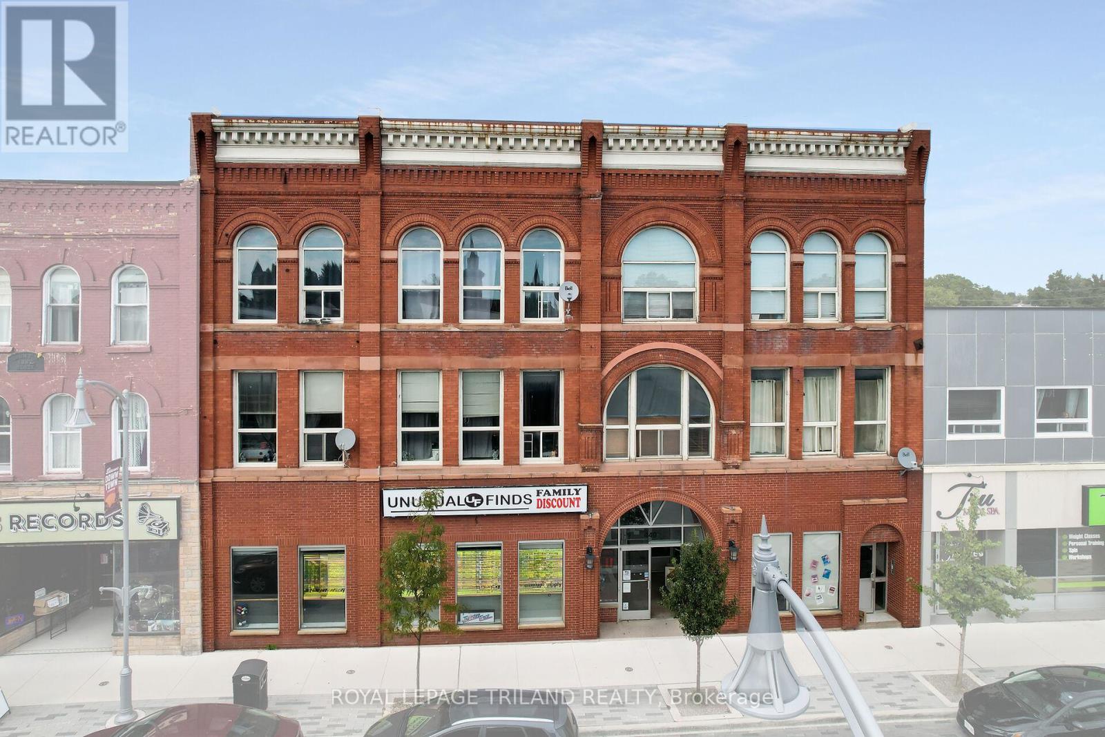 This mixed-use commercial property at 449-453 Talbot Street in the heart of Downtown St. Thomas presents a prime investment opportunity, offering the option of commercial space with vacant possession on closing or a fully tenanted building. Zoned C2, the property features an 8000 sq. ft. ground-floor commercial unit at 449 Talbot Street along with seven spacious loft-style residential units at 453 Talbot Street, each with separate hydro meters, hot water tanks, furnaces, and central air. With a gross annual rental income of $184,530, strong visibility, and excellent accessibility in a rapidly growing community, this property delivers solid returns and future growth potential. Extras: possibility of retail business for sale. (id:48254)