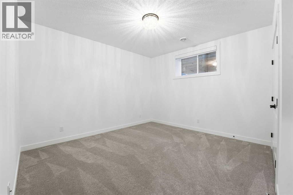 65 Rowmont Link Nw, Calgary, Alberta  T3L 0J3 - Photo 36 - A2266220