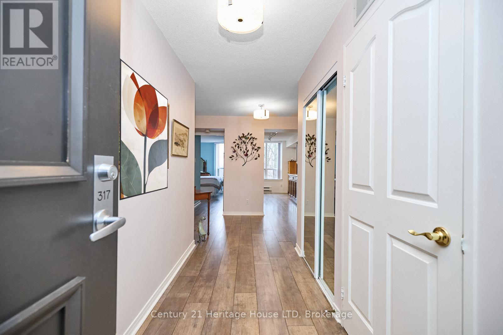 317 - 8111 Forest Glen Drive, Niagara Falls, Ontario L2H 2Y7 - Photo 5 - X12342001