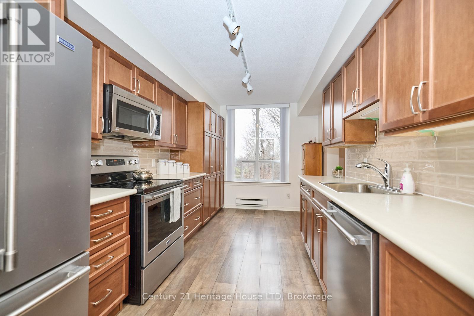 317 - 8111 Forest Glen Drive, Niagara Falls, Ontario L2H 2Y7 - Photo 7 - X12342001