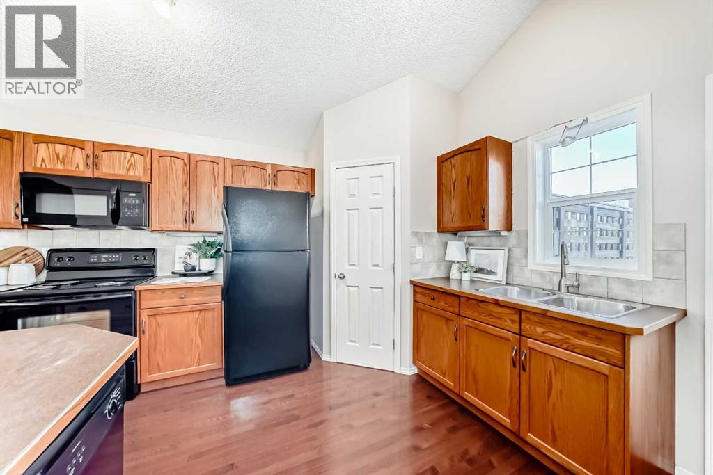 1046 Channelside Way Sw, Airdrie, Alberta  T4B 3H9 - Photo 5 - A2264035