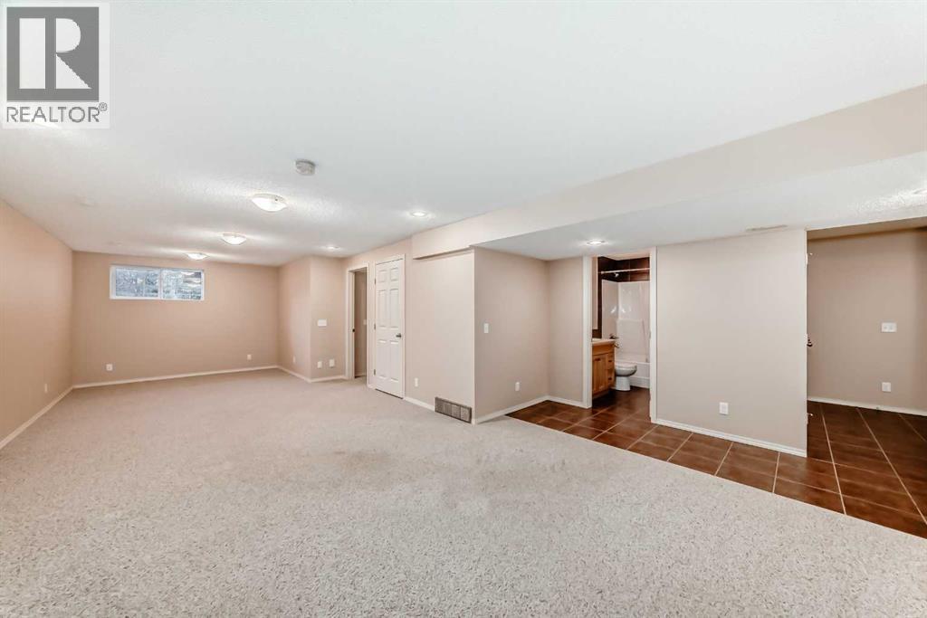 1046 Channelside Way Sw, Airdrie, Alberta  T4B 3H9 - Photo 26 - A2264035