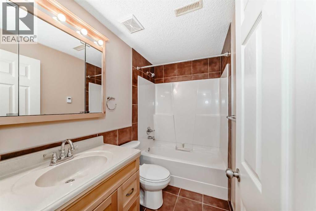 1046 Channelside Way Sw, Airdrie, Alberta  T4B 3H9 - Photo 30 - A2264035