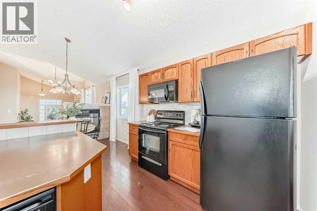 1046 Channelside Way Sw, Airdrie, Alberta  T4B 3H9 - Photo 6 - A2264035