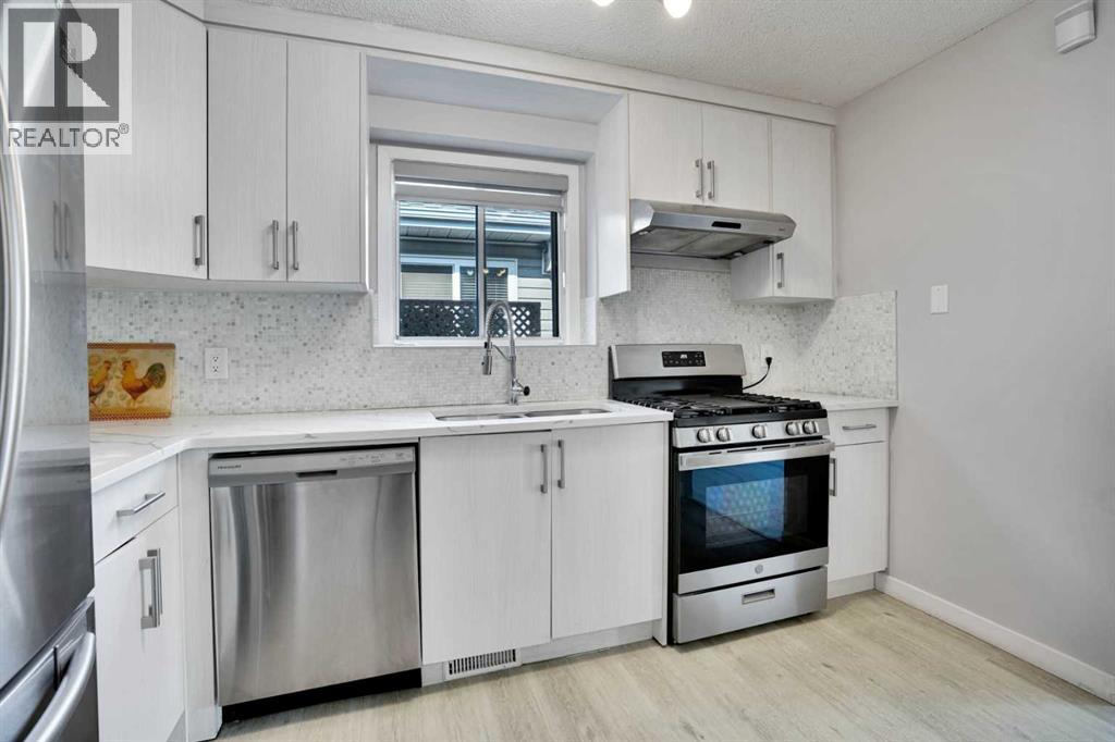 20 Tararidge Close Ne, Calgary, Alberta t3j 2p7 - Photo 11 - A2260250