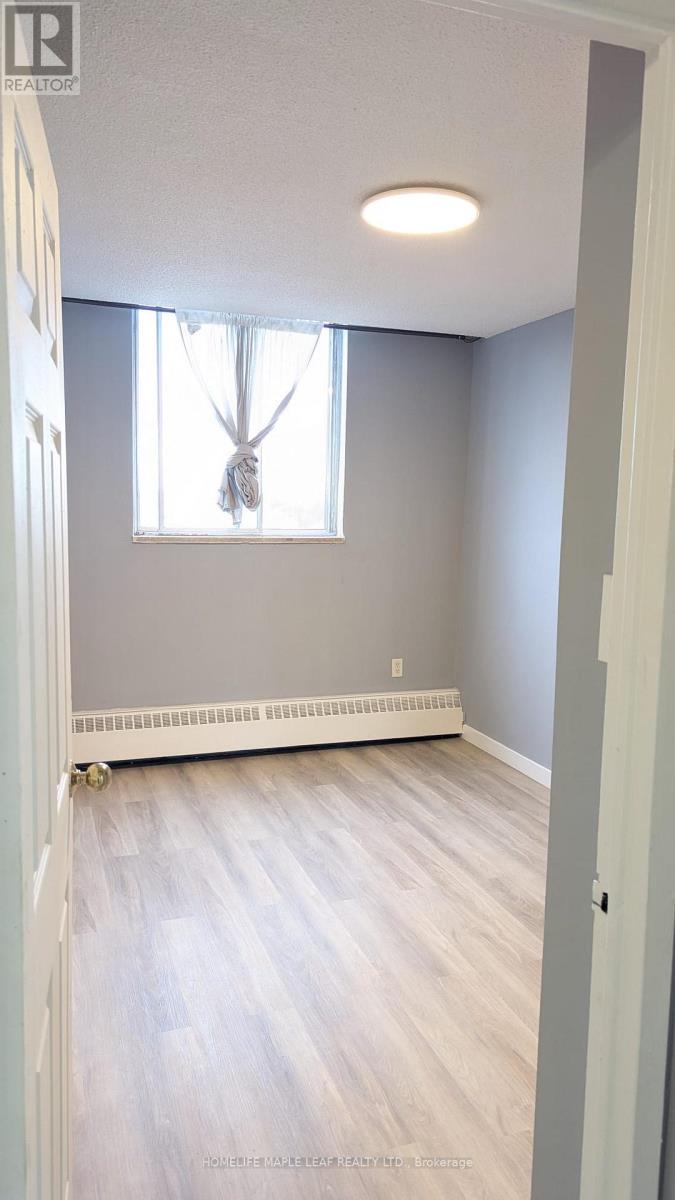 1211 - 200 Lotherton Pathway, Toronto, Ontario  M6B 2G8 - Photo 8 - W12482052