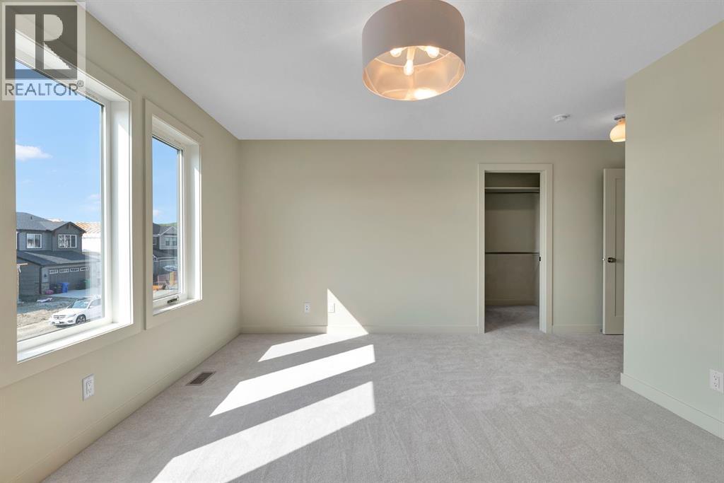 92 Fireside Common, Cochrane, Alberta  T4C 3J1 - Photo 25 - A2254583