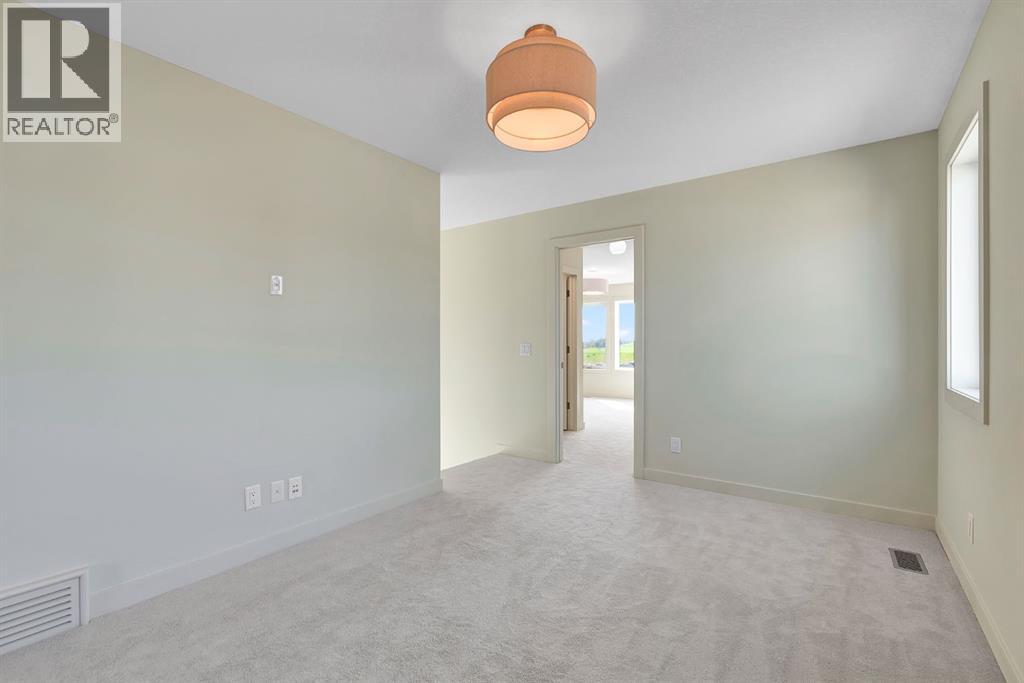 92 Fireside Common, Cochrane, Alberta  T4C 3J1 - Photo 38 - A2254583