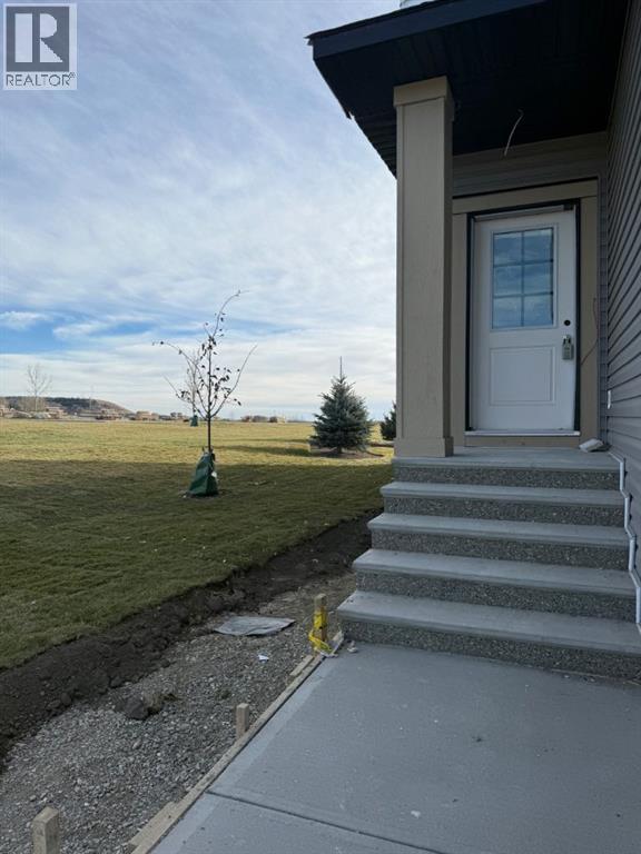 524 Heritage Boulevard, Cochrane, Alberta  T4C 2J8 - Photo 2 - A2265581
