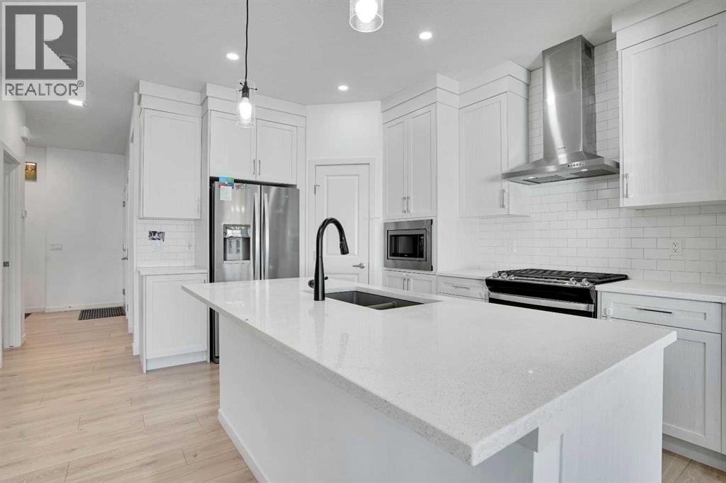 1517 Bayview Point Sw, Airdrie, Alberta  T4B 5K1 - Photo 6 - A2266938
