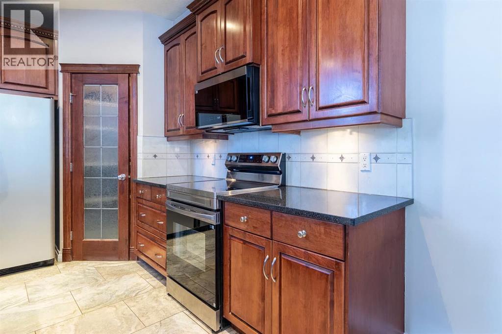 1421 40 Street Sw, Calgary, Alberta  T3C 1W8 - Photo 8 - A2266142