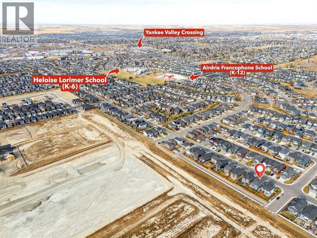 2148 Ravensdun Crescent Se, Airdrie, Alberta  T4A 3K3 - Photo 2 - A2266873