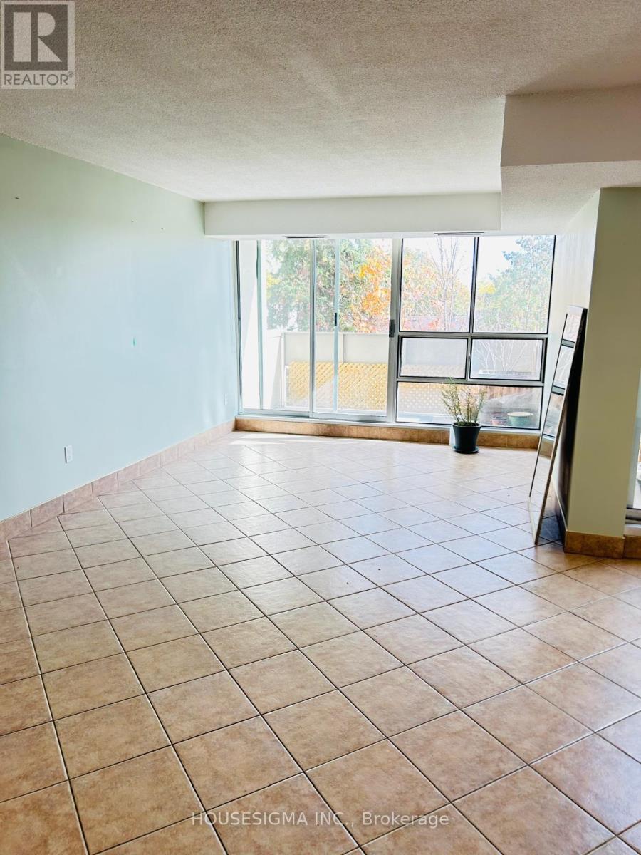 314 - 1300 Marlborough Court, Oakville, Ontario  L6H 2S2 - Photo 4 - W12482666