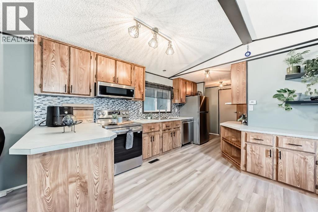 119 Home Bay Se, High River, Alberta  T1V 1J8 - Photo 4 - A2265436