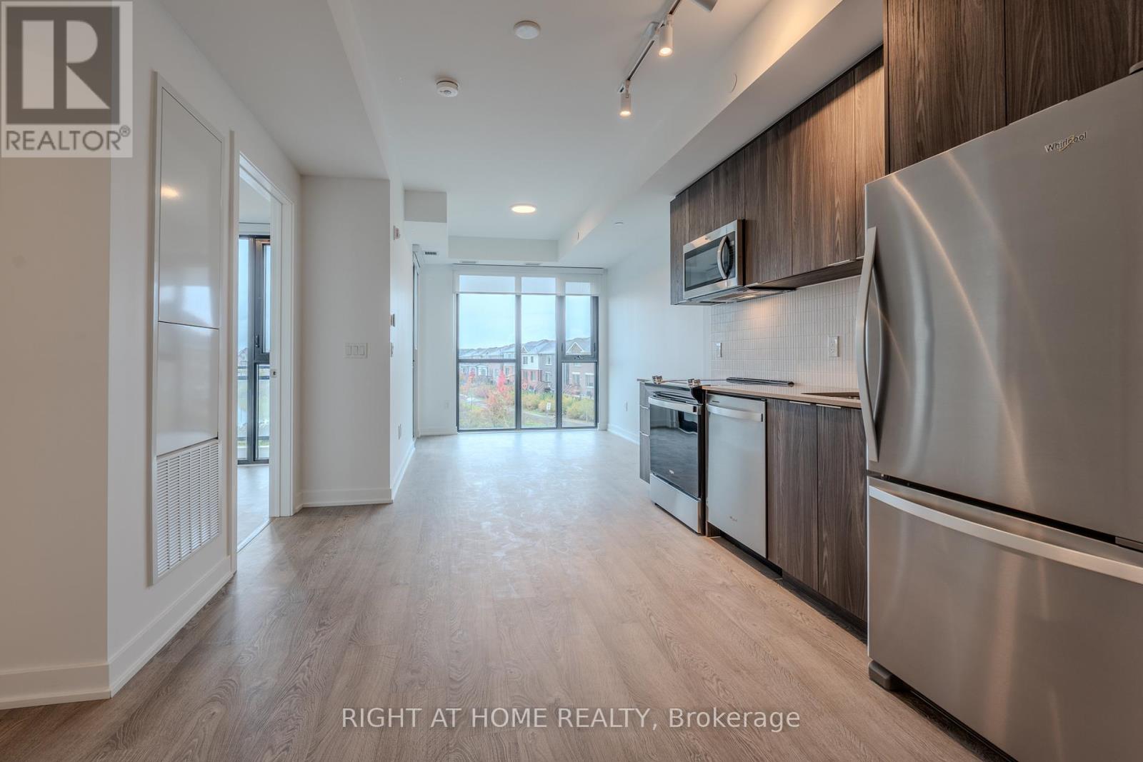 215 - 720 Whitlock Avenue, Milton, Ontario  L9E 2B5 - Photo 4 - W12482676