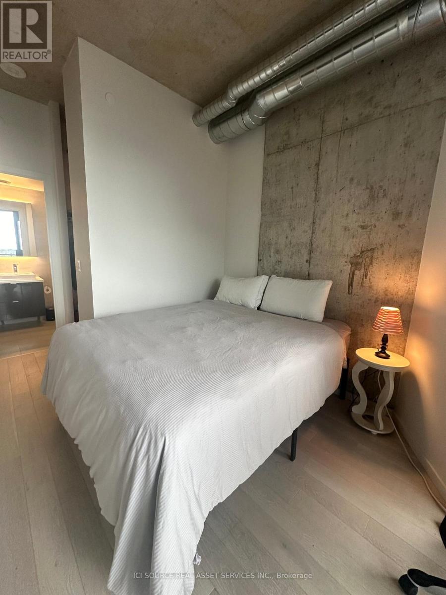 912 - 21 Lawren Harris Square, Toronto, Ontario  M5A 0N7 - Photo 2 - C12482697