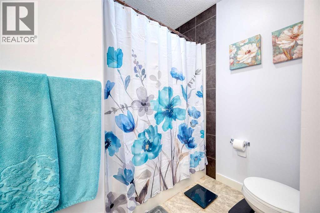 226 Pantego Lane Nw, Calgary, Alberta  T3K 0T1 - Photo 16 - A2234709