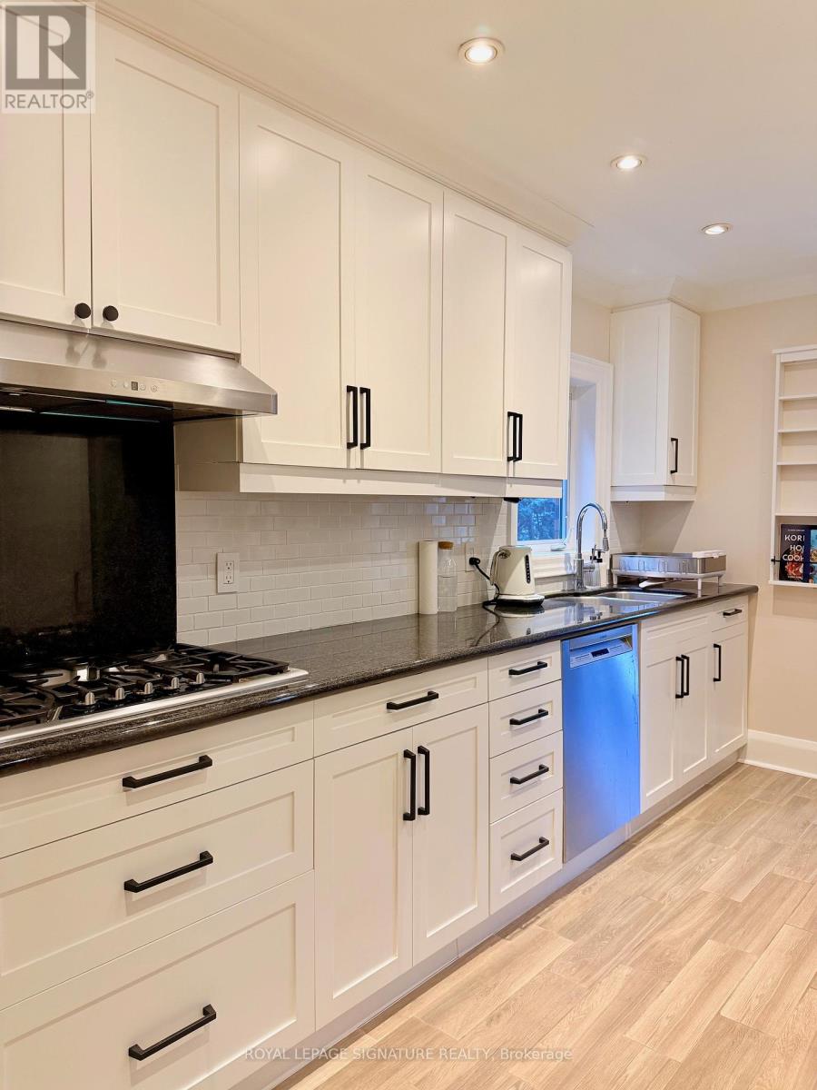 38 Jackson Avenue, Toronto, Ontario  M8X 2J4 - Photo 11 - W12482745
