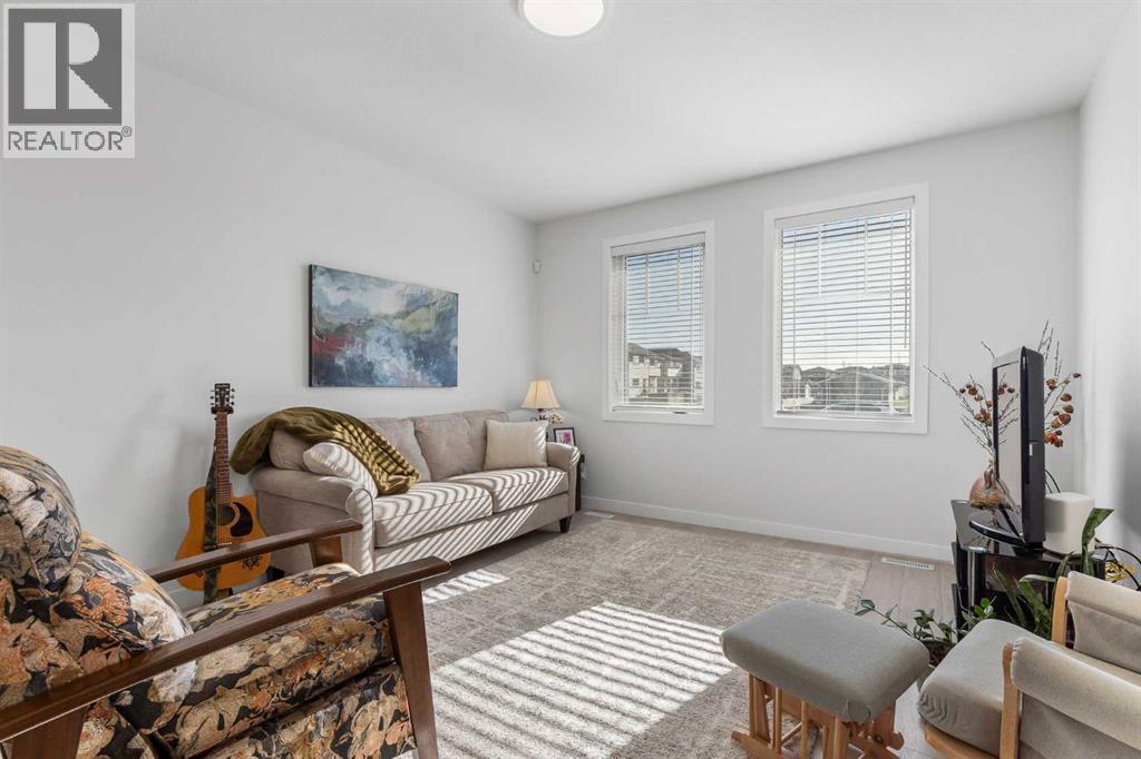 492 Reynolds Avenue Sw, Airdrie, Alberta  T4B 5G2 - Photo 3 - A2266364