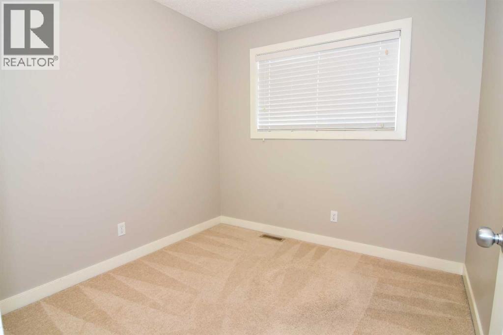 156 Pantego Lane Nw, Calgary, Alberta  T3K 0T1 - Photo 13 - A2260230