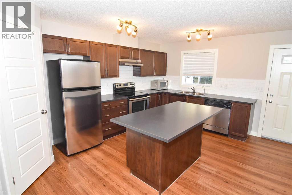 156 Pantego Lane Nw, Calgary, Alberta  T3K 0T1 - Photo 4 - A2260230