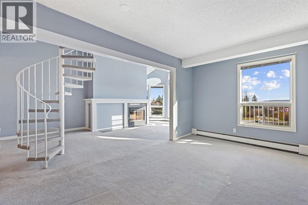 309, 102 Centre Court, Okotoks, Alberta  T1S 1Z7 - Photo 9 - A2266543