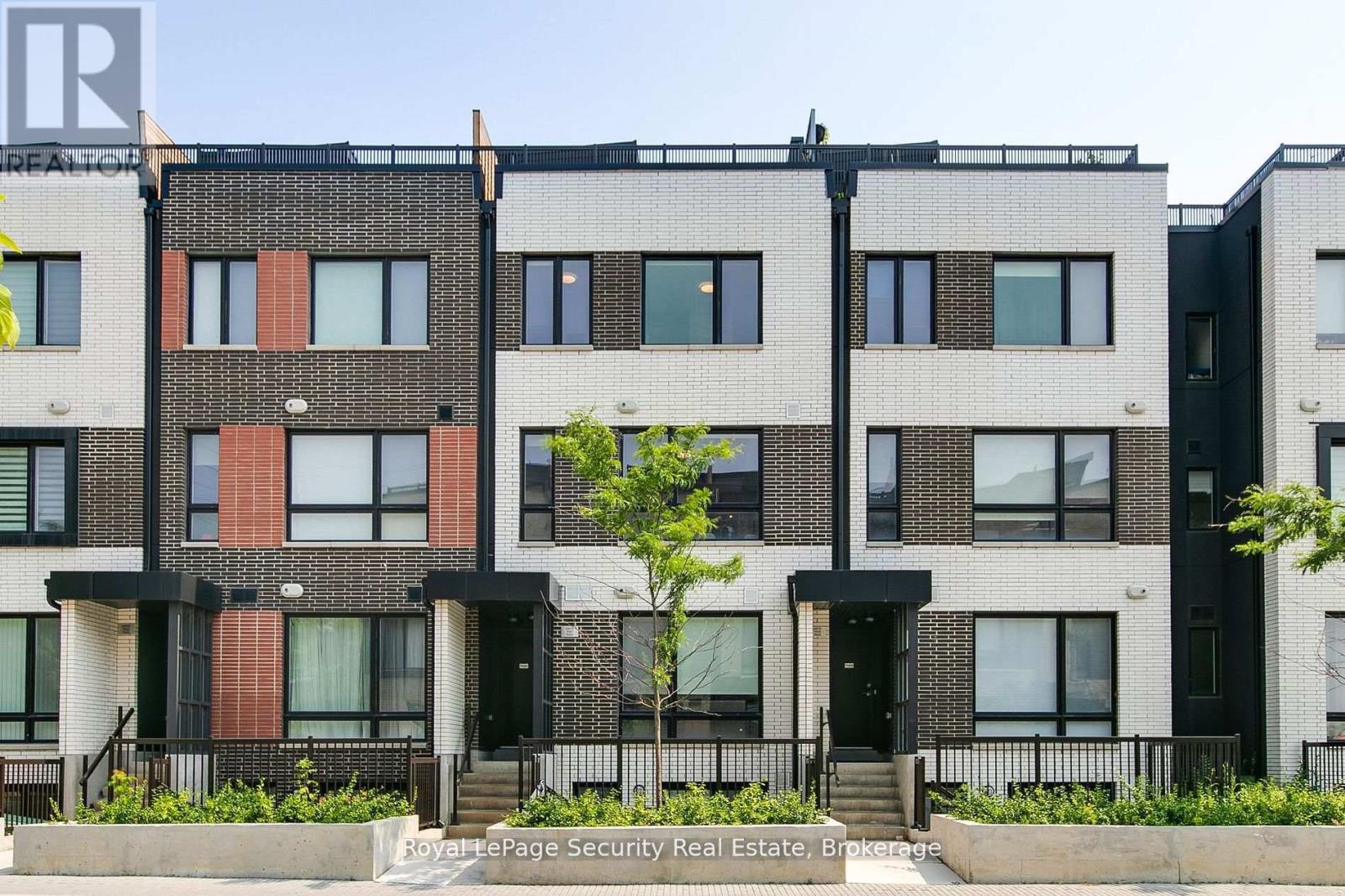Th 22 - 40 Ed Clark Gardens, Toronto, Ontario  M6N 0B5 - Photo 3 - W12482932