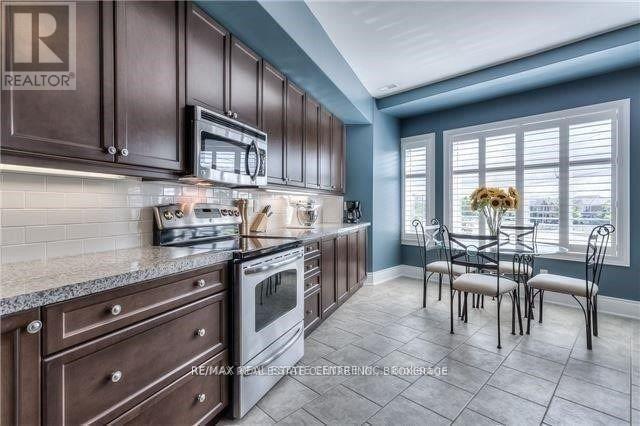 9075 Derry Road, Milton, Ontario  L9T 7Y9 - Photo 2 - W12482953