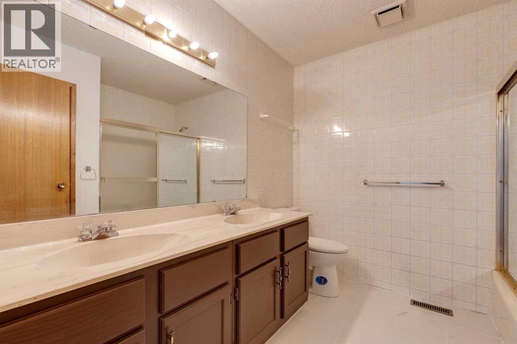 80 Beacham Rise Nw, Calgary, Alberta  T3K 1S2 - Photo 30 - A2266688