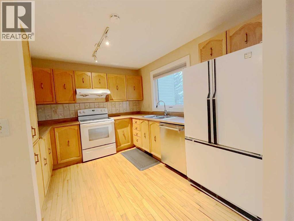 33 Millrise Lane Sw, Calgary, Alberta  T2Y 2C3 - Photo 9 - A2251709