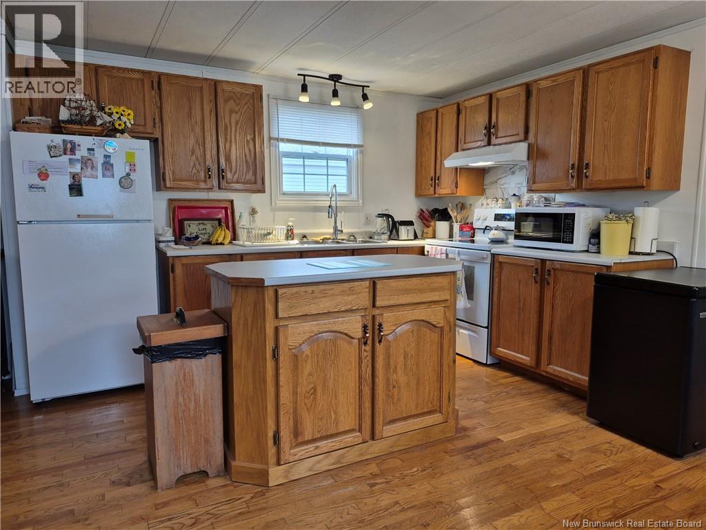 23 Tyler Street, Lincoln, New Brunswick  E3B 6X4 - Photo 2 - NB125114
