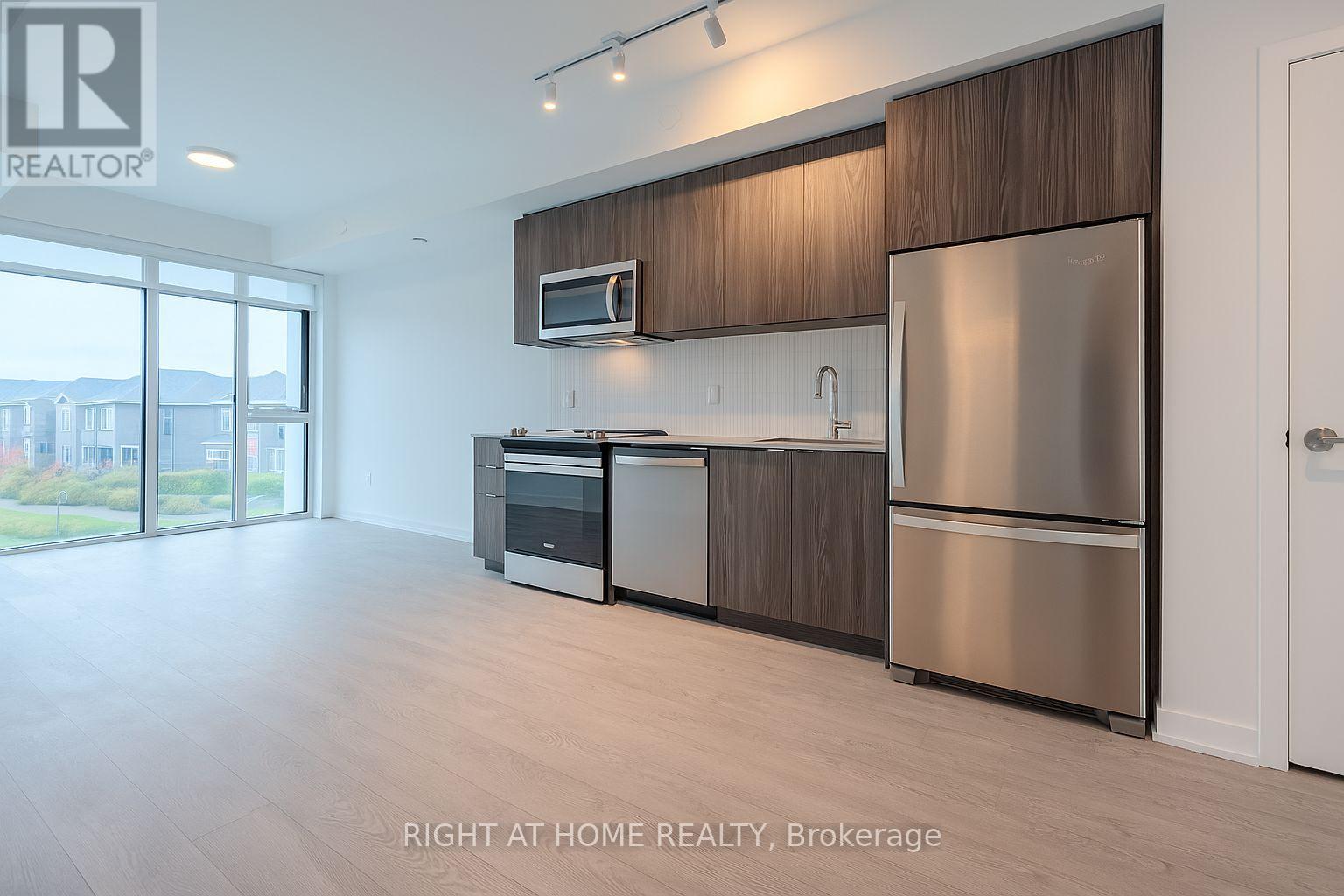 215 - 720 Whitlock Avenue, Milton (Wi Willmott), Ontario  L9E 2B5 - Photo 4 - W12482676