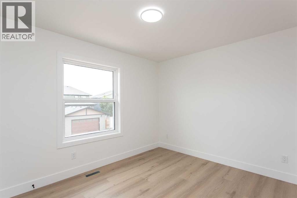 17 Thatcher Avenue, Red Deer, Alberta  T4P 0Y6 - Photo 32 - A2226910