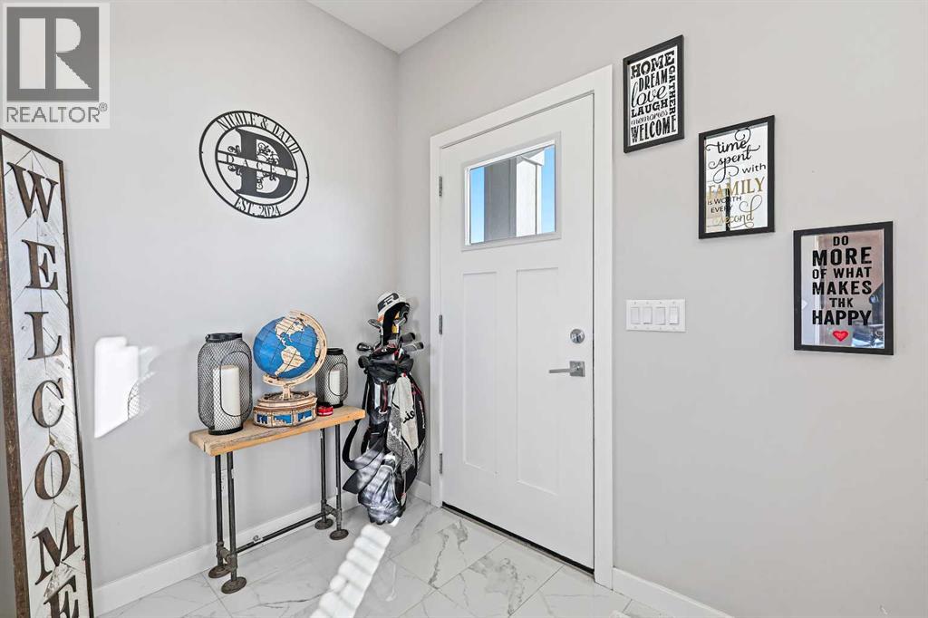 193 Creekside Drive Sw, Calgary, Alberta  T2X 4X7 - Photo 3 - A2258533