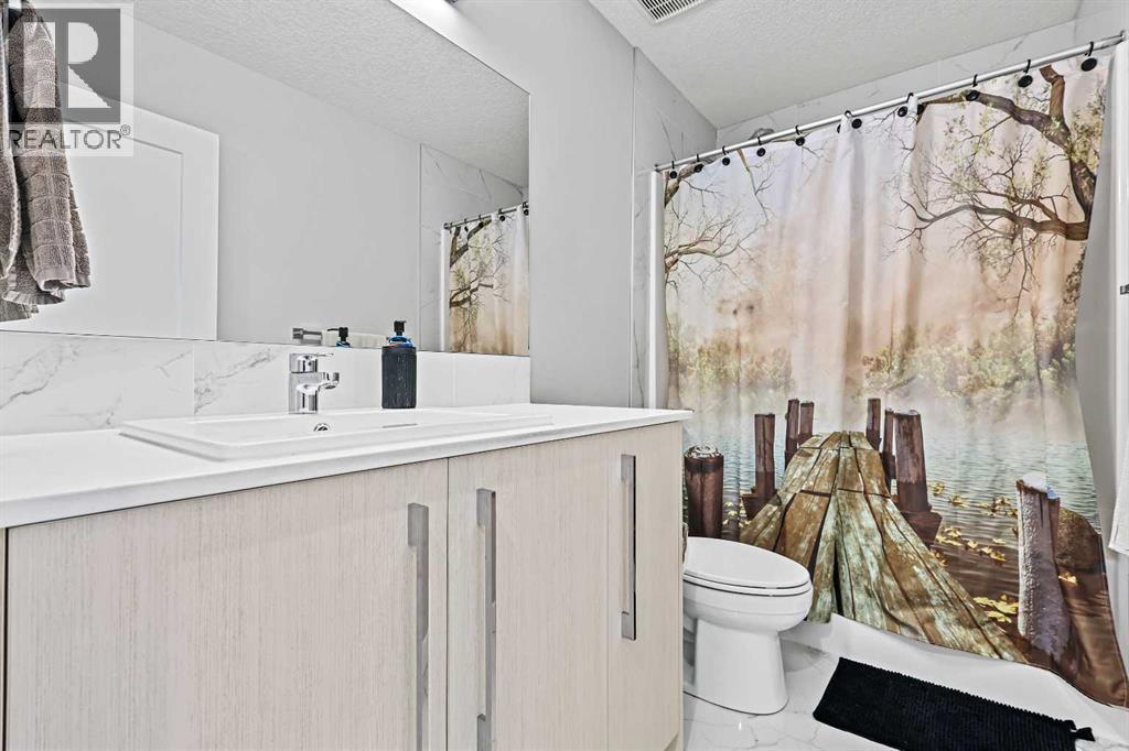 193 Creekside Drive Sw, Calgary, Alberta  T2X 4X7 - Photo 25 - A2258533