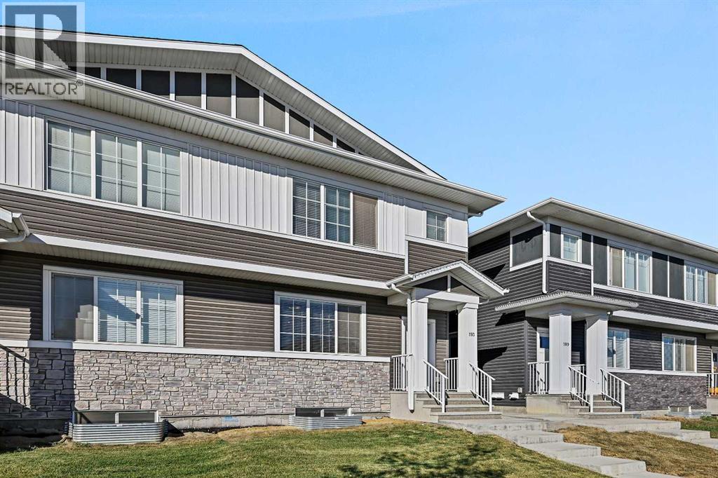 193 Creekside Drive Sw, Calgary, Alberta  T2X 4X7 - Photo 2 - A2258533