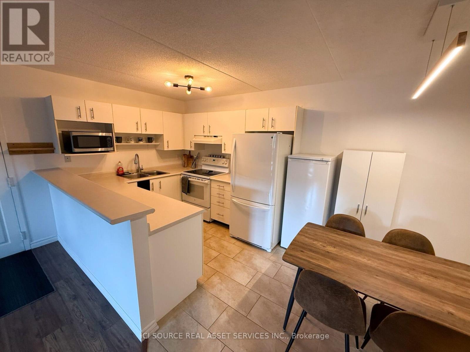 204 - 4003 Kilmer Drive, Burlington, Ontario  L7M 4M1 - Photo 6 - W12483250