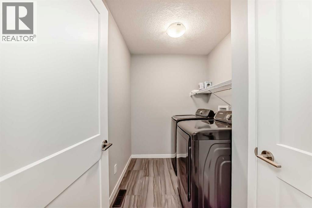 269 Ellen Way, Crossfield, Alberta  T0M 0S0 - Photo 39 - A2246754