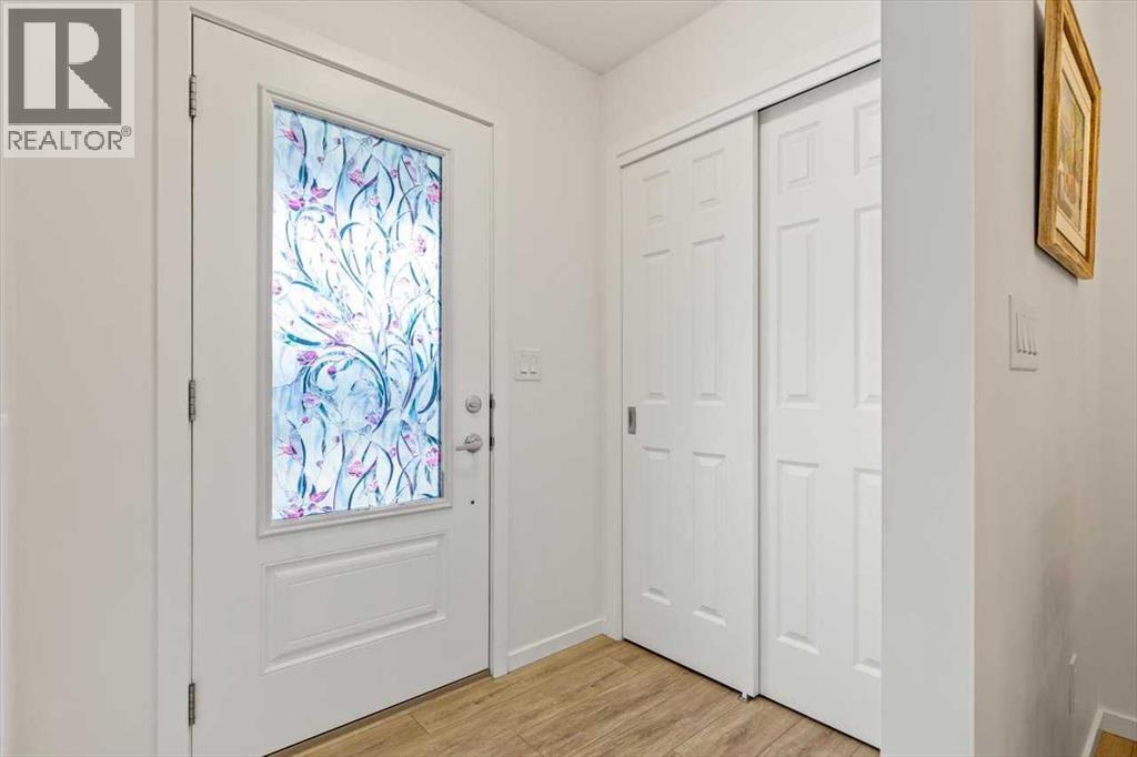 602 Osborne Drive Sw, Airdrie, Alberta  T4B 5G6 - Photo 4 - A2264984